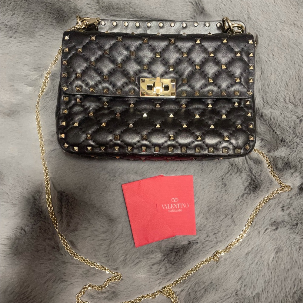 Valentino Garavani
Rockstud Quilted Leather Top Handle Bag